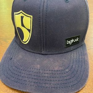 Well worn BIGtruck High-fives NavyBlue Adjustable trucker cap.